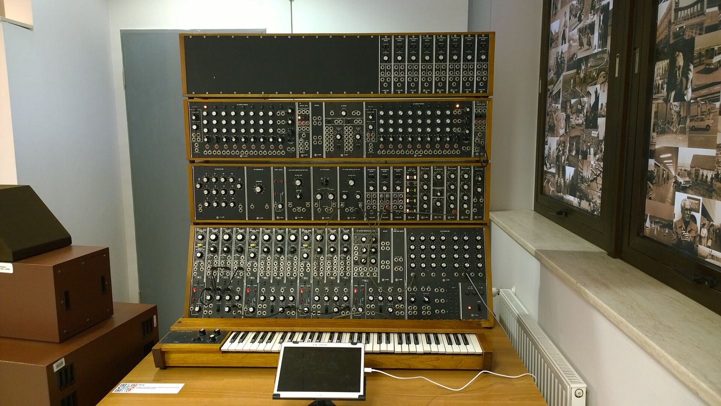 a 1973 moog modular synthesizer with patch cables connecting its modules