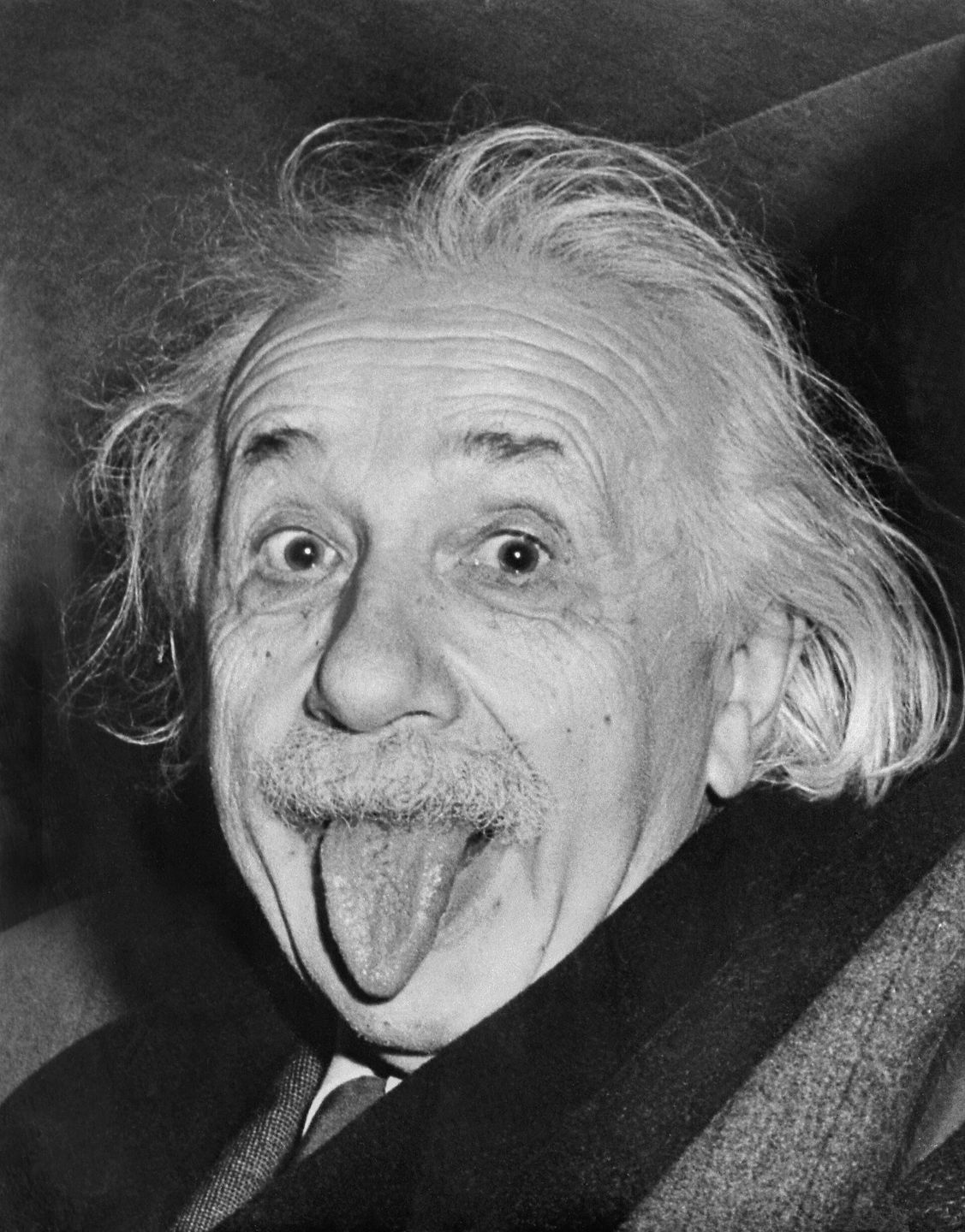 albert einstein sticking his tongue out, a famous photograph from 1951