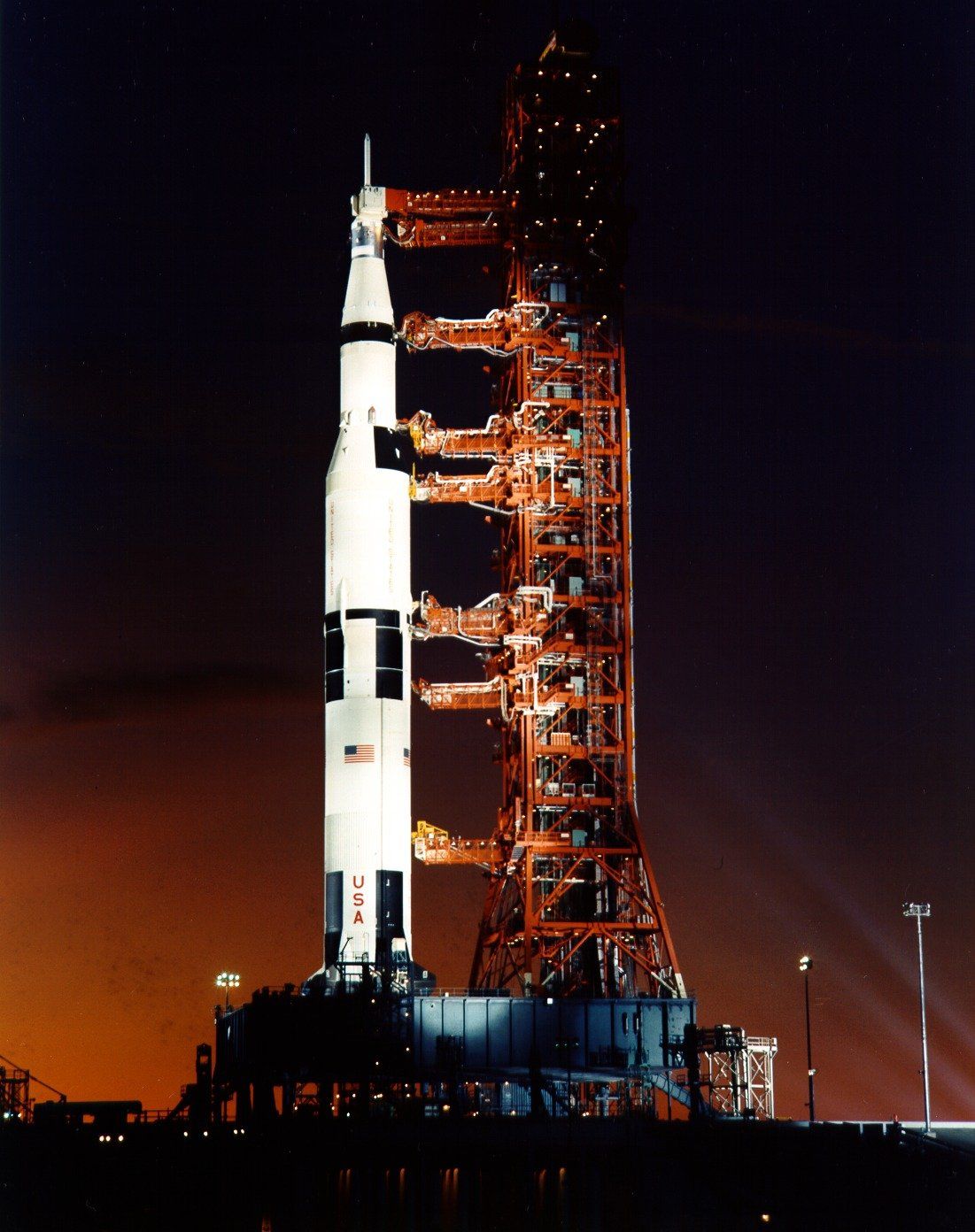 Apollo 8 Saturn V rocket on the launch pad at twilight