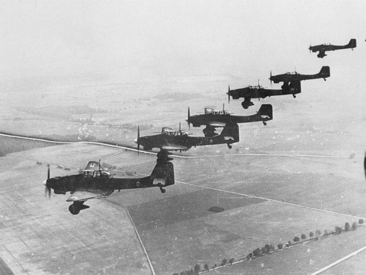 German Junkers Ju 87 Stuka dive bombers flying in formation over Poland, 1939