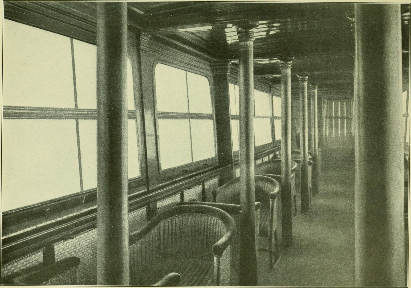 interior cabin of the zeppelin airship hansa showing passenger seating