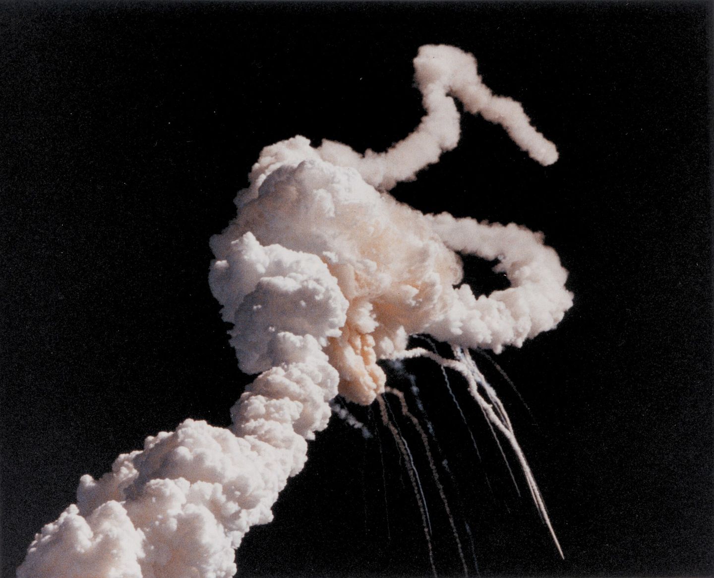 the space shuttle challenger breaking apart 73 seconds after launch, january 28, 1986