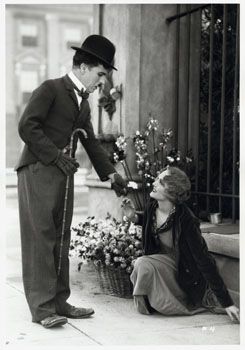 still from charlie chaplin's city lights (1931), a silent film made after talkies became standard