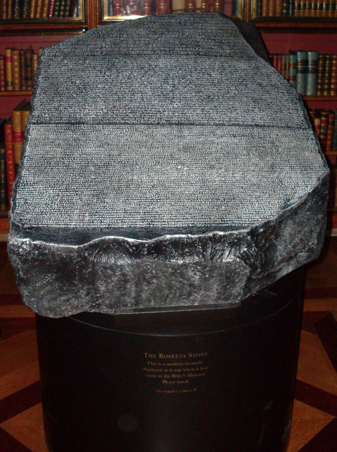 A replica of the Rosetta Stone, the ancient decree inscribed in three scripts that Young helped decipher