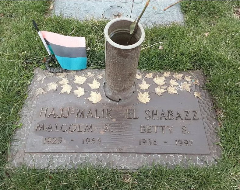 grave plaque inscribed el-hajj malik el-shabazz, the name malcolm x took after mecca