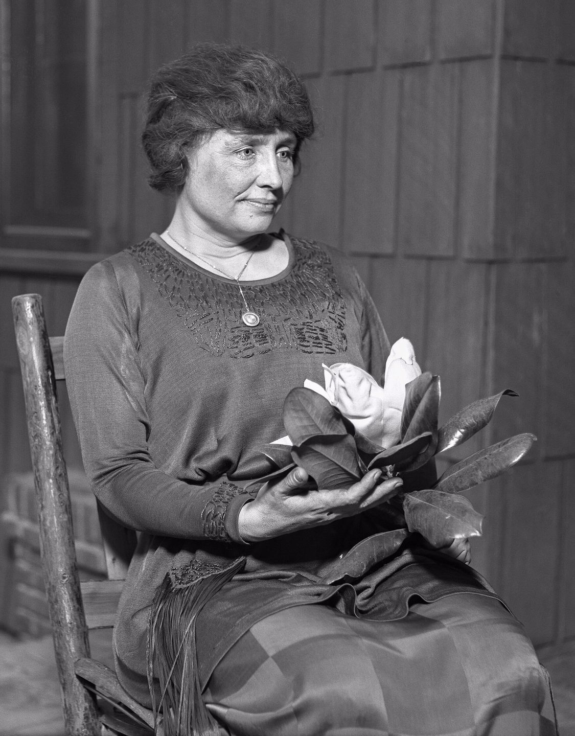Helen Keller, deaf-blind author and activist, photographed circa 1920