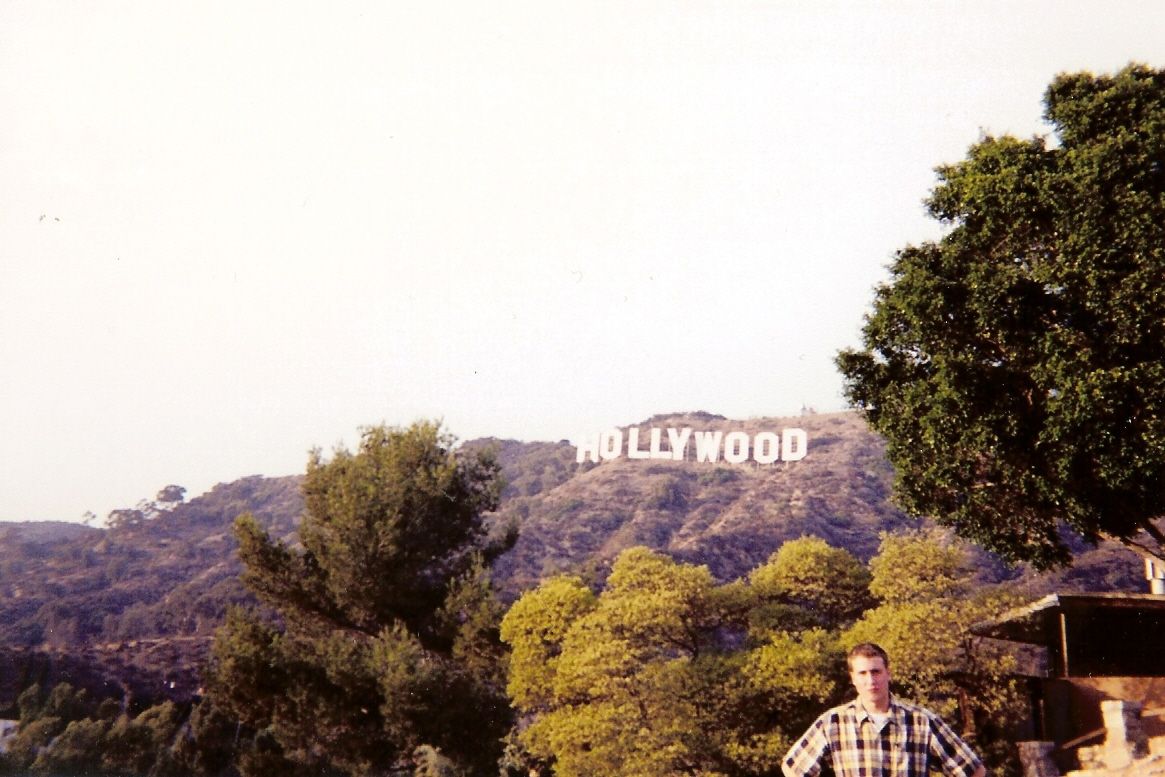 wide view of the hollywood sign on the hillside above los angeles