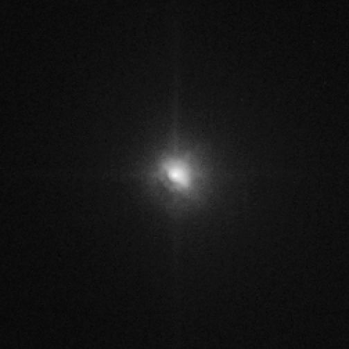 Hubble Space Telescope view of comet Tempel 1 brightening just after impact