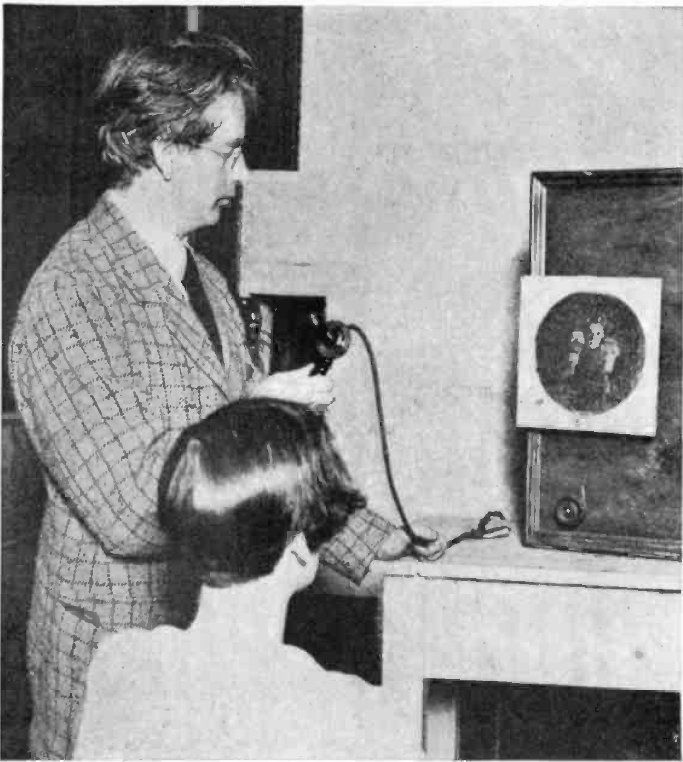 john logie baird with his early television receiver apparatus