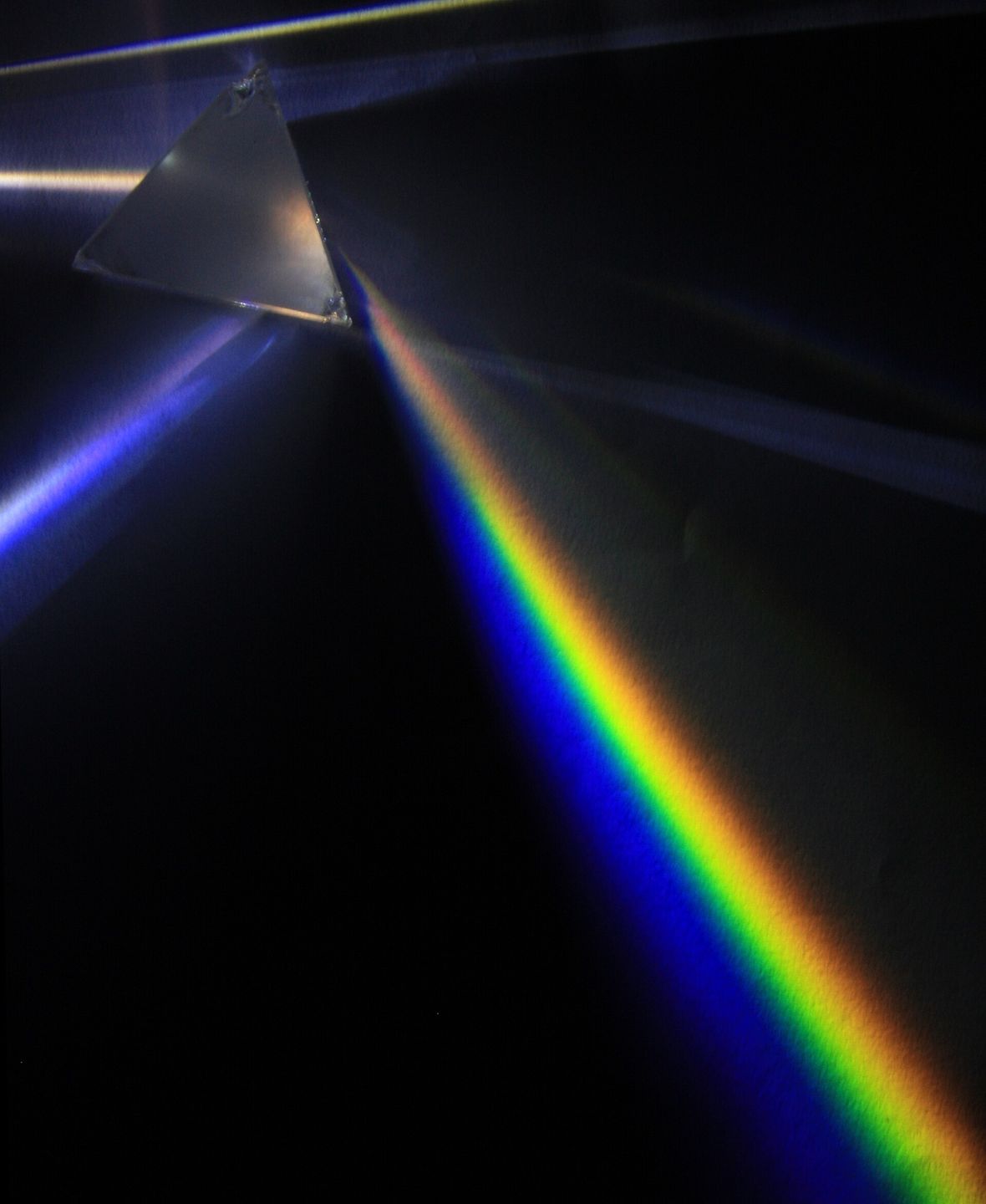 Light dispersion through a glass prism, showing the spectral lines used in spectroscopy