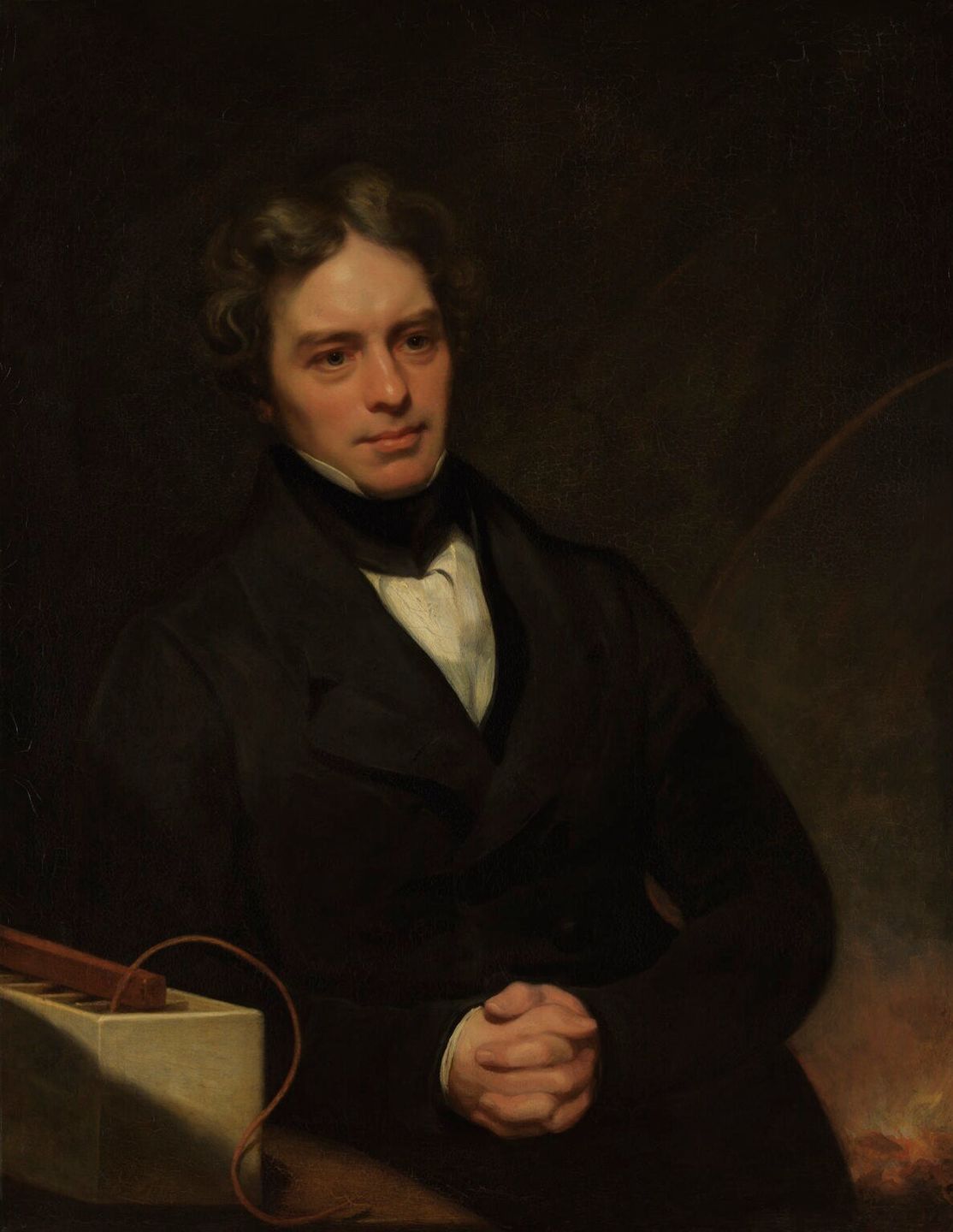Portrait of Michael Faraday, who discovered electromagnetic induction and built the first electric motor
