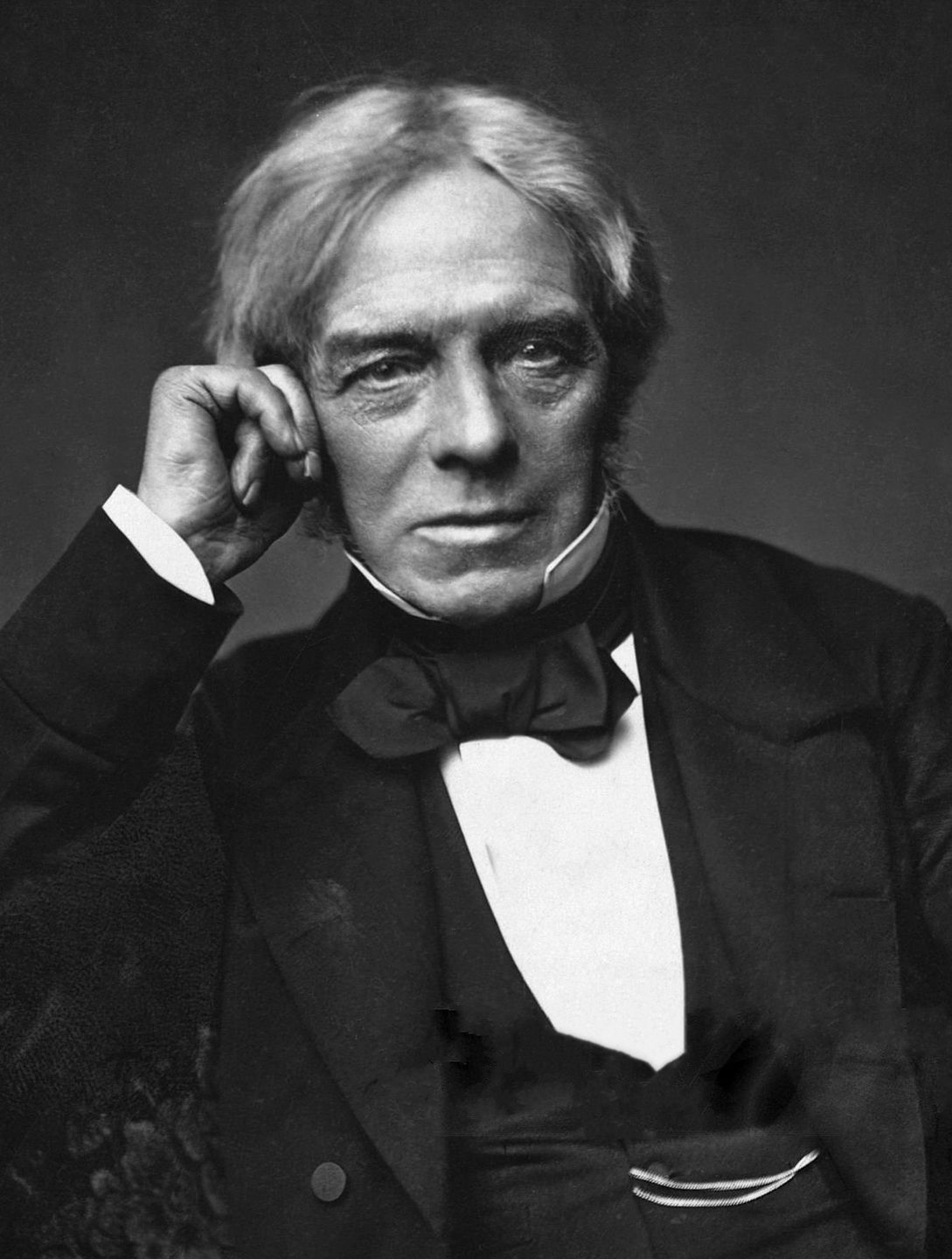 Michael Faraday seated in his laboratory at the Royal Institution