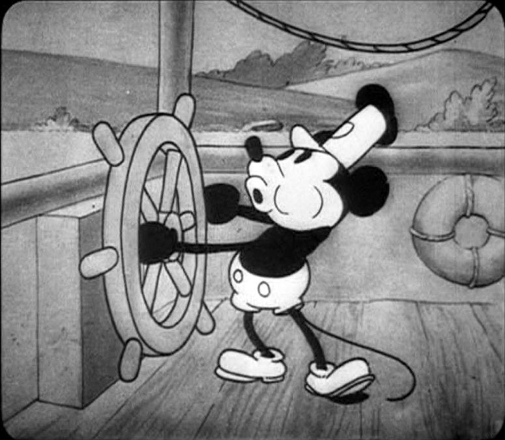 mickey mouse at the wheel in steamboat willie, 1928, the first cartoon with synchronized sound