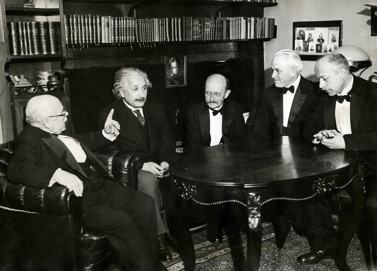 walther nernst, albert einstein, max planck, robert millikan, and max von laue photographed together in 1931