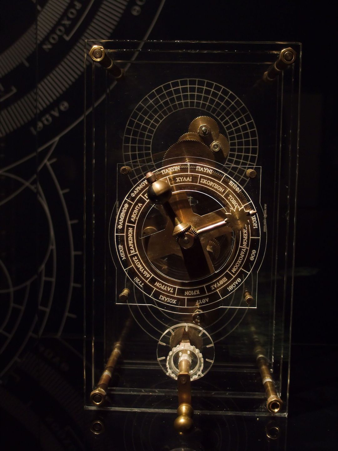 a modern reconstruction of the Antikythera Mechanism showing its bronze gear trains
