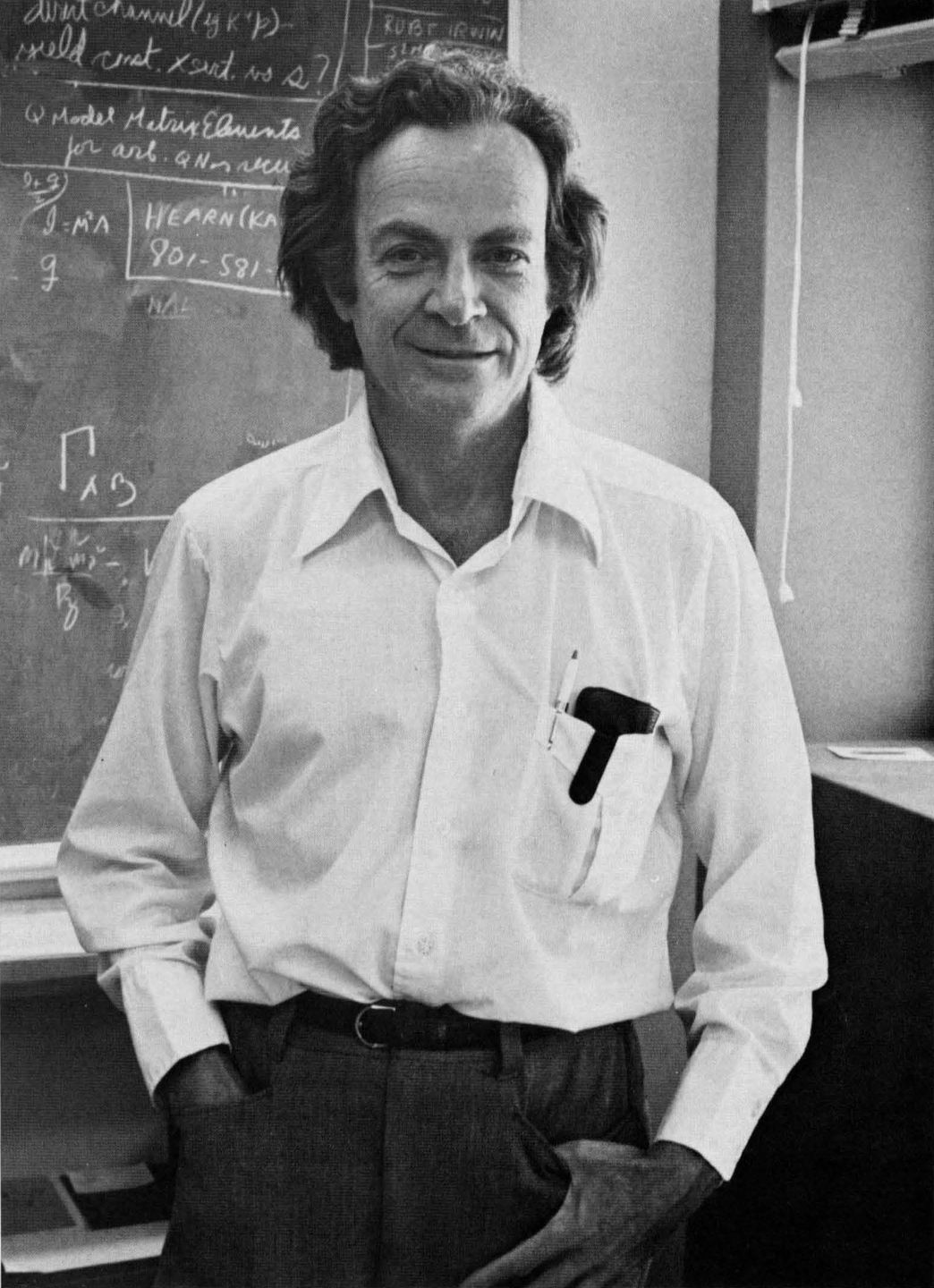 richard feynman smiling in a photograph taken in 1988, the year he died, showing the physicist in a relaxed and characteristically playful mood