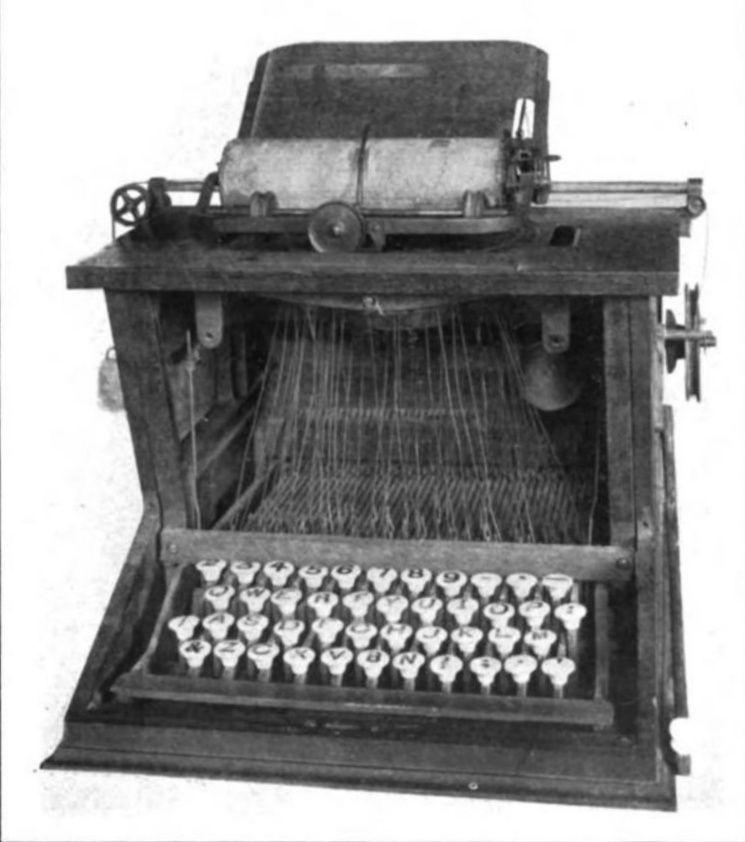a sholes and glidden typewriter, the first commercially successful typewriter, on display