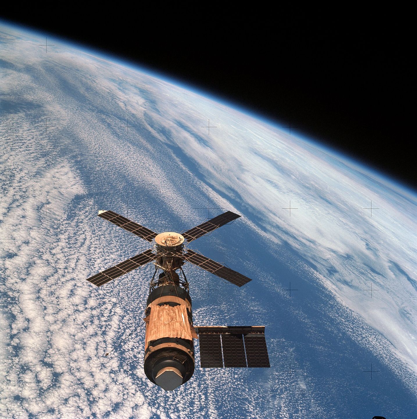 nasa skylab space station photographed in earth orbit against the earth's limb