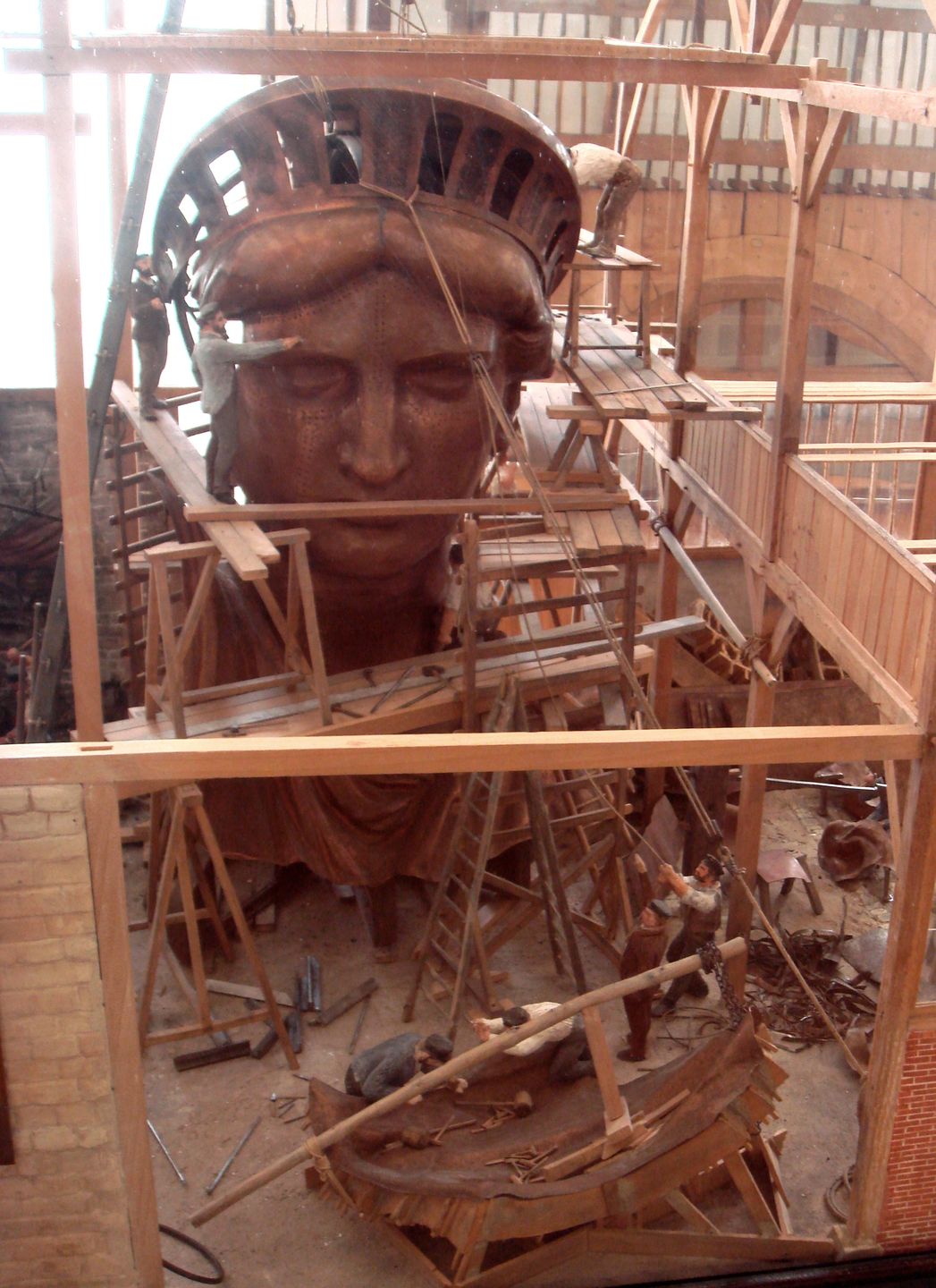 The copper statue under construction in Paris around 1880