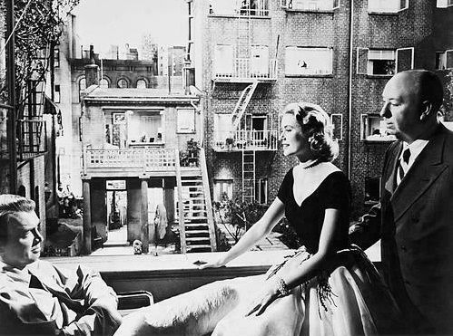 Alfred Hitchcock directing James Stewart and Grace Kelly on the set of Rear Window