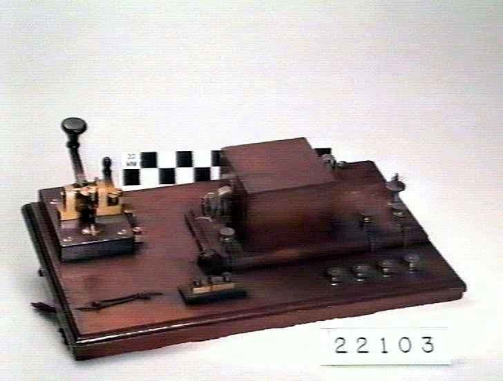 A Victorian-era telegraph key and relay instrument