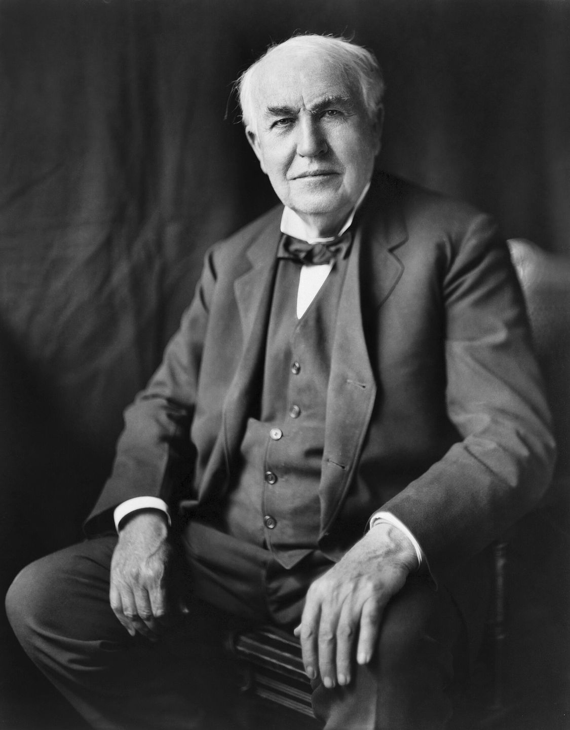 Portrait of Thomas Edison seated, photographed by Bachrach Studios