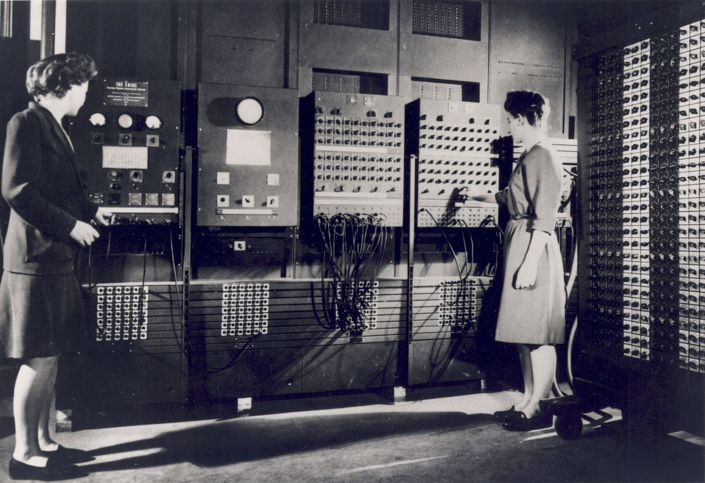 Two of the ENIAC programmers operating the machine