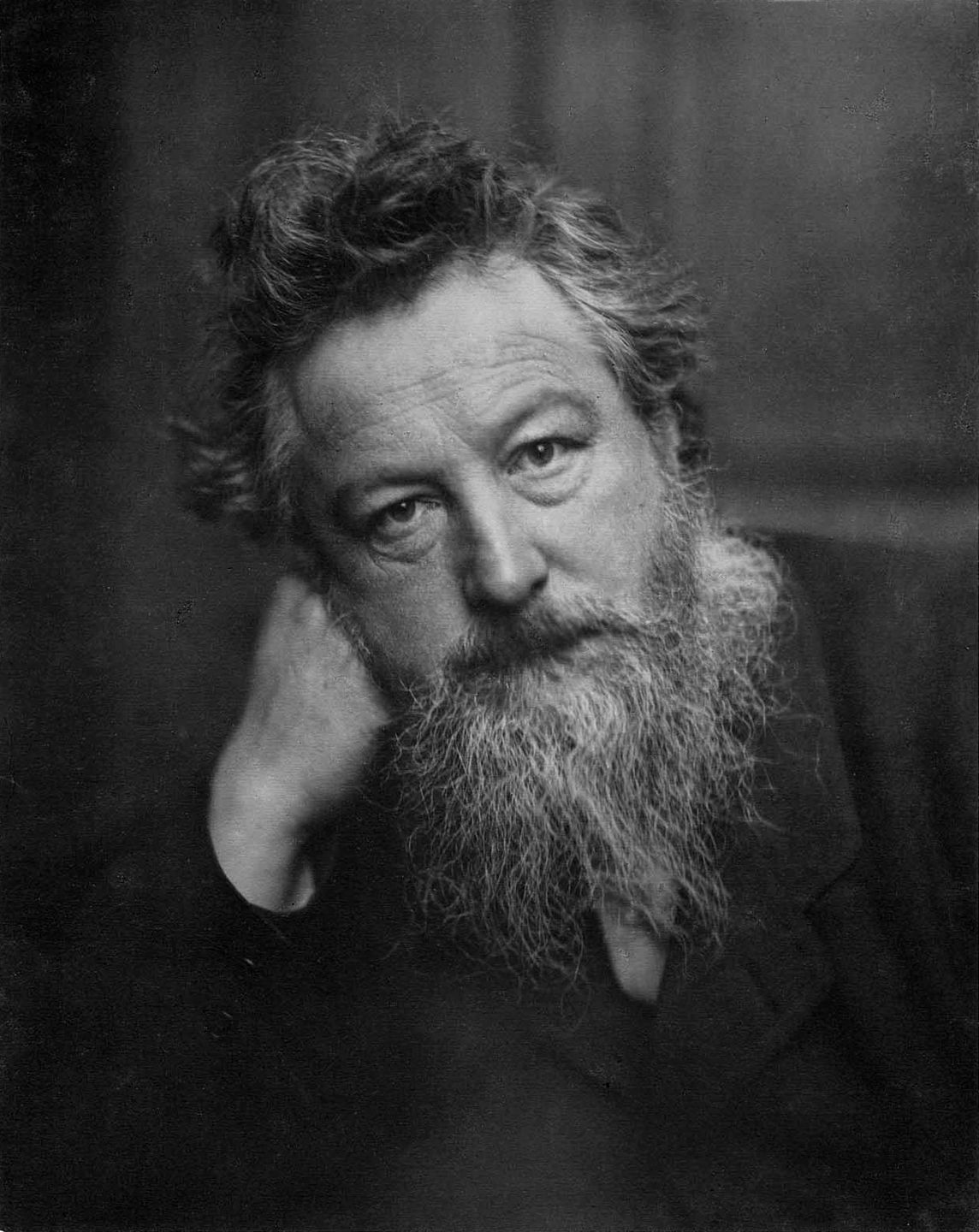 portrait of william morris at age 53, designer, artist, and founder of the arts and crafts movement